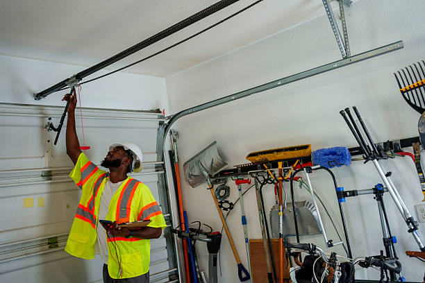 Professional Garage Door Spring Repair technician working in Hillsboro, OR